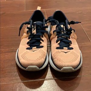 Hoka One One. Peach and navy colors